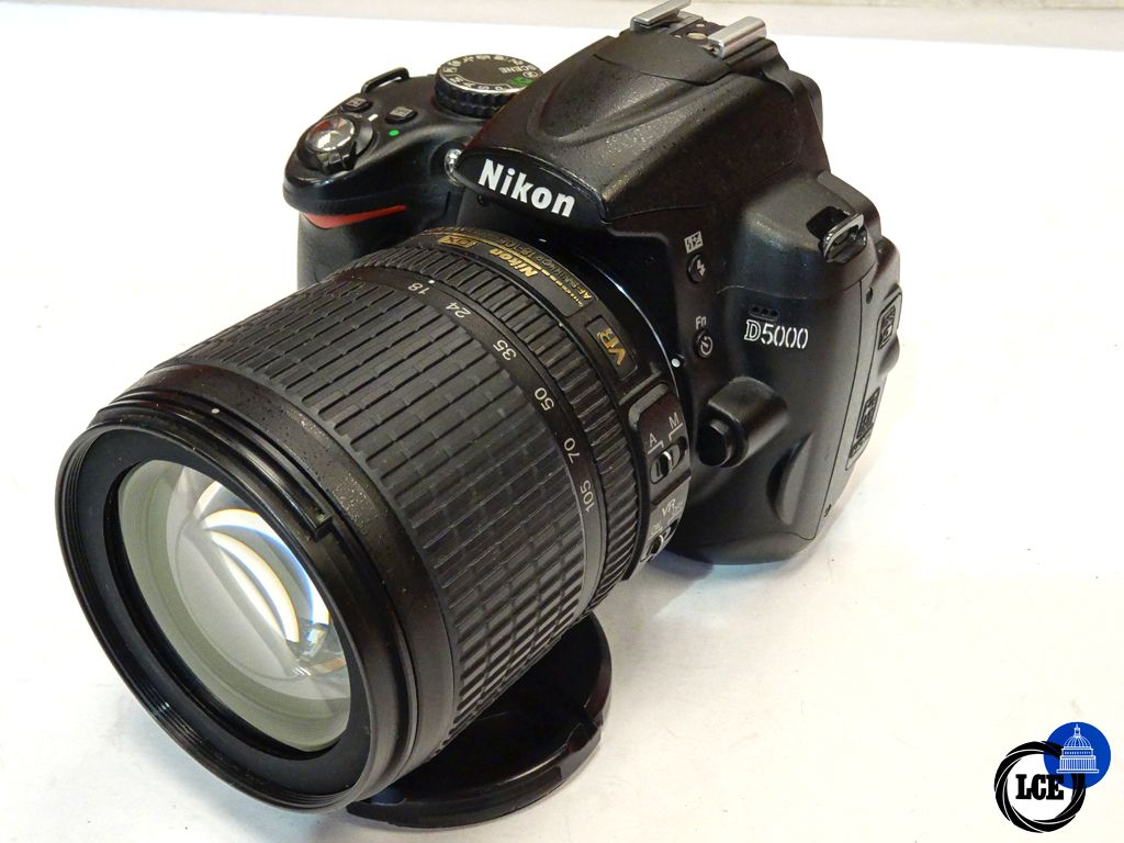 Nikon D5000 +  18-105mm 
