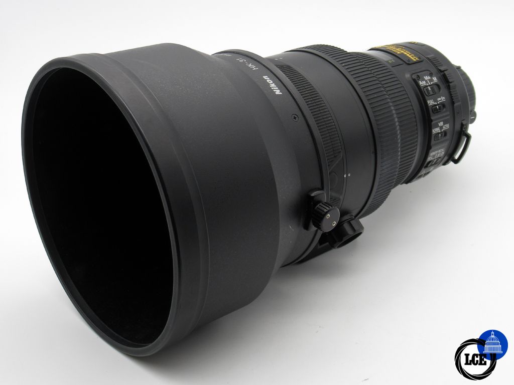 Nikon  AF-S 200mm f/2 G II ED N with soft case.