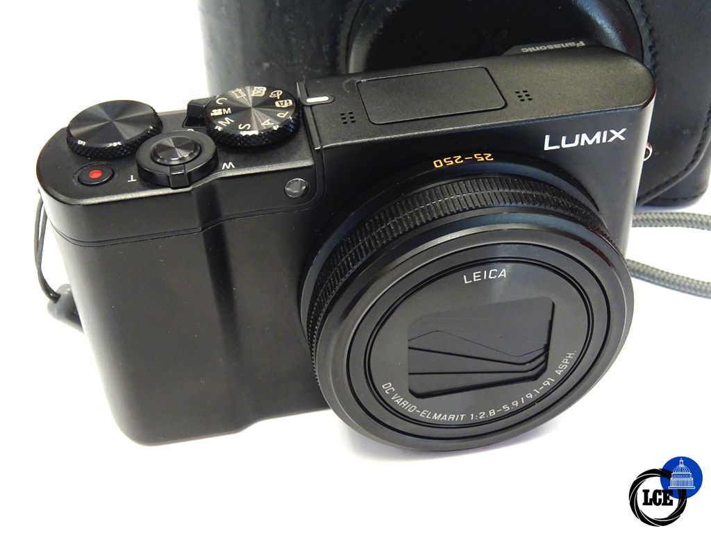 Panasonic TZ100 with leather case. Panasonic TZ100 with leather case.