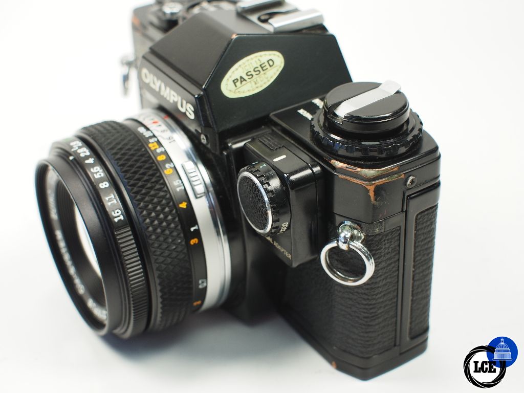 Olympus OM-10 Black with 50mm f1.8 and manual adapter