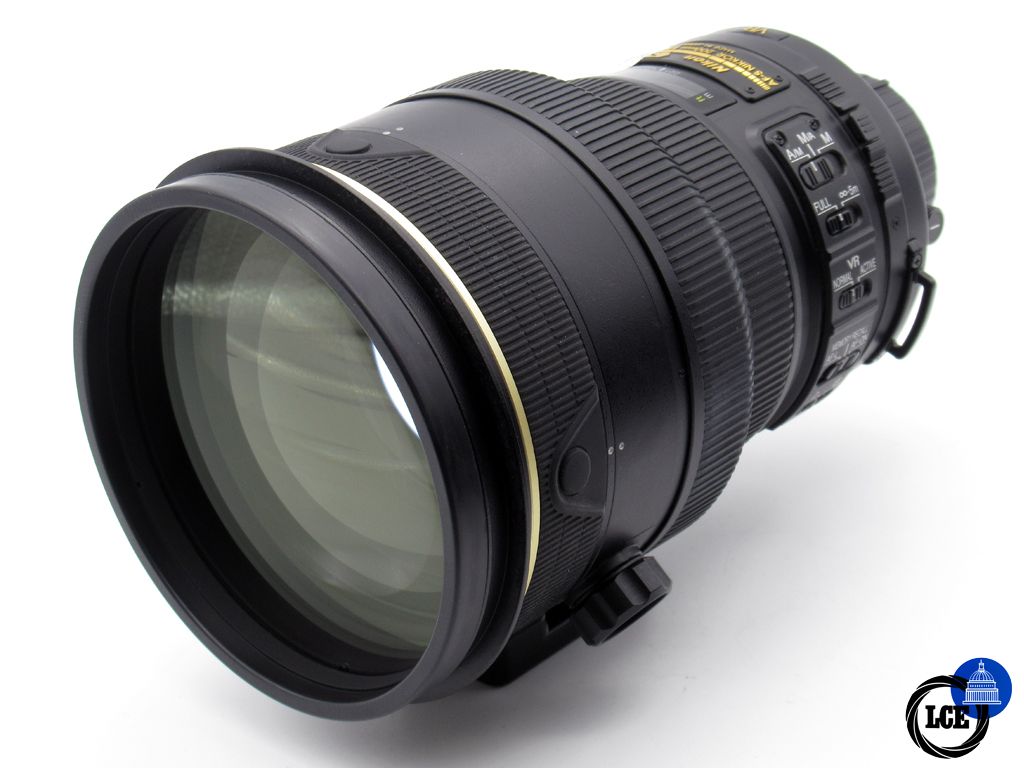 Nikon  AF-S 200mm f/2 G II ED N with soft case.