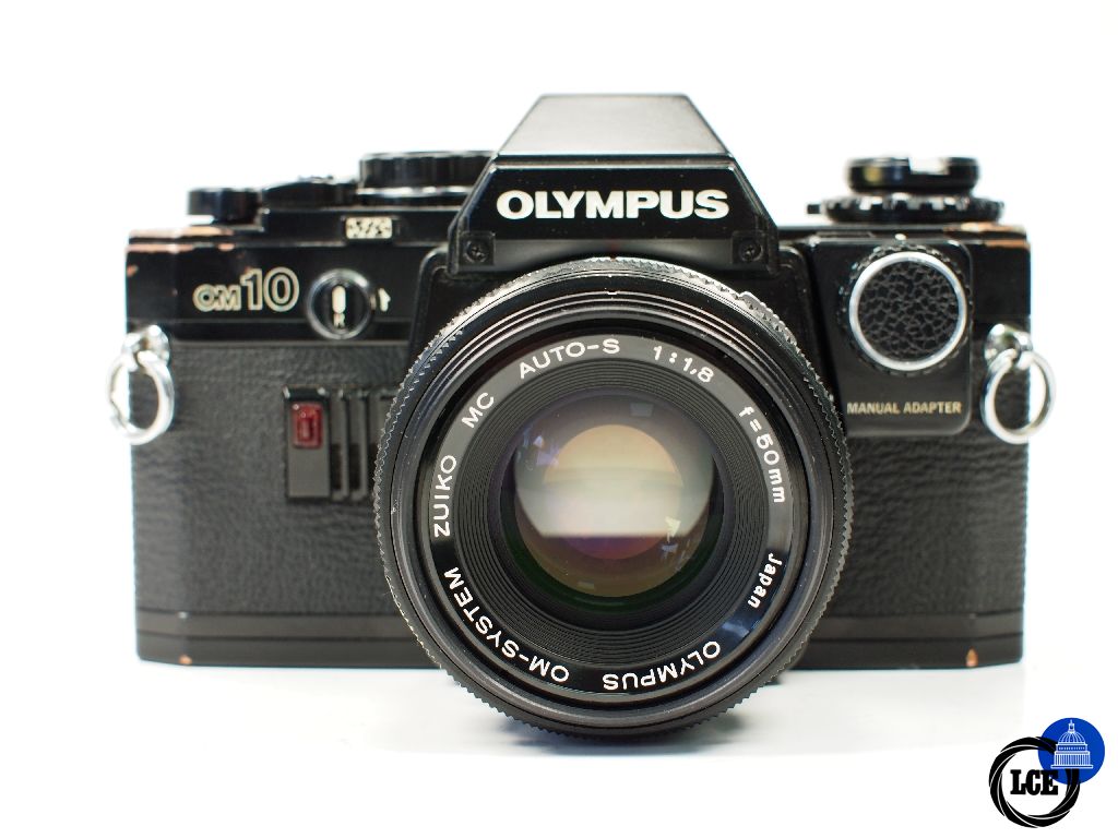 Olympus OM-10 Black with 50mm f1.8 and manual adapter